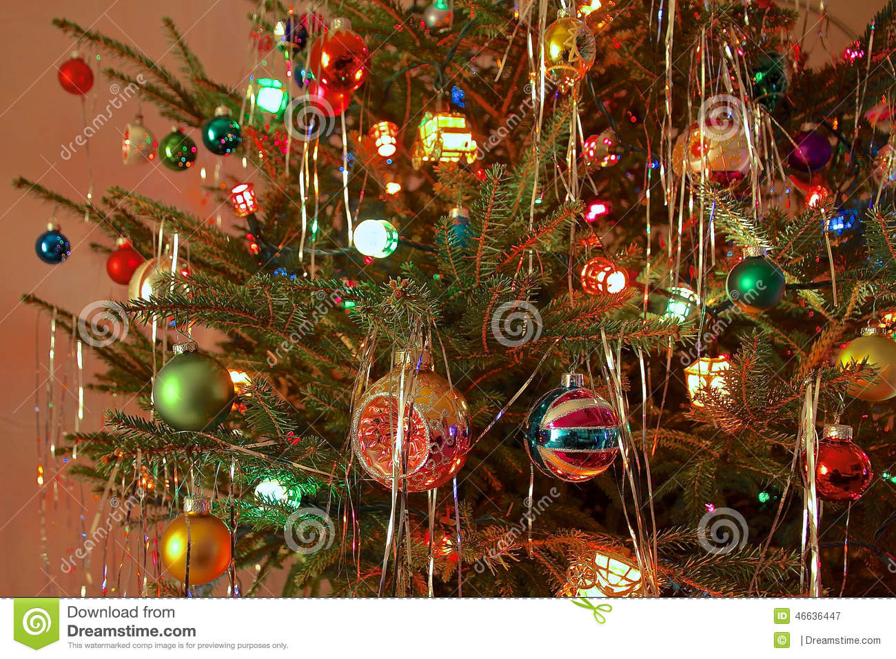 kitsch-s-style-decorated-christmas-tree-close-up-antique-glass-baubles-coloured-lights-retro-46636447.jpg